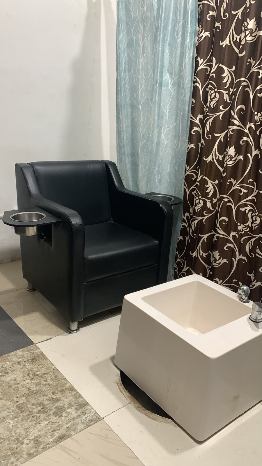 Dedicated luxury pedicure chair with whirlpool foot basin at Sparkle